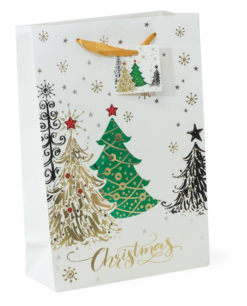 The "Gift Bag: Christmas Tree Foil Bag Small" features charming white and gold script Christmas tree designs, accented with red stars and delicate snowflakes, and includes a matching gift tag.