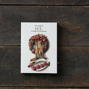 A Card Pack: Jul - A taste of Christmas by Koustrupco, featuring 8 festive cards and envelopes with different images, is perfect for gifting or pairing with Scandinavian Christmas cards.