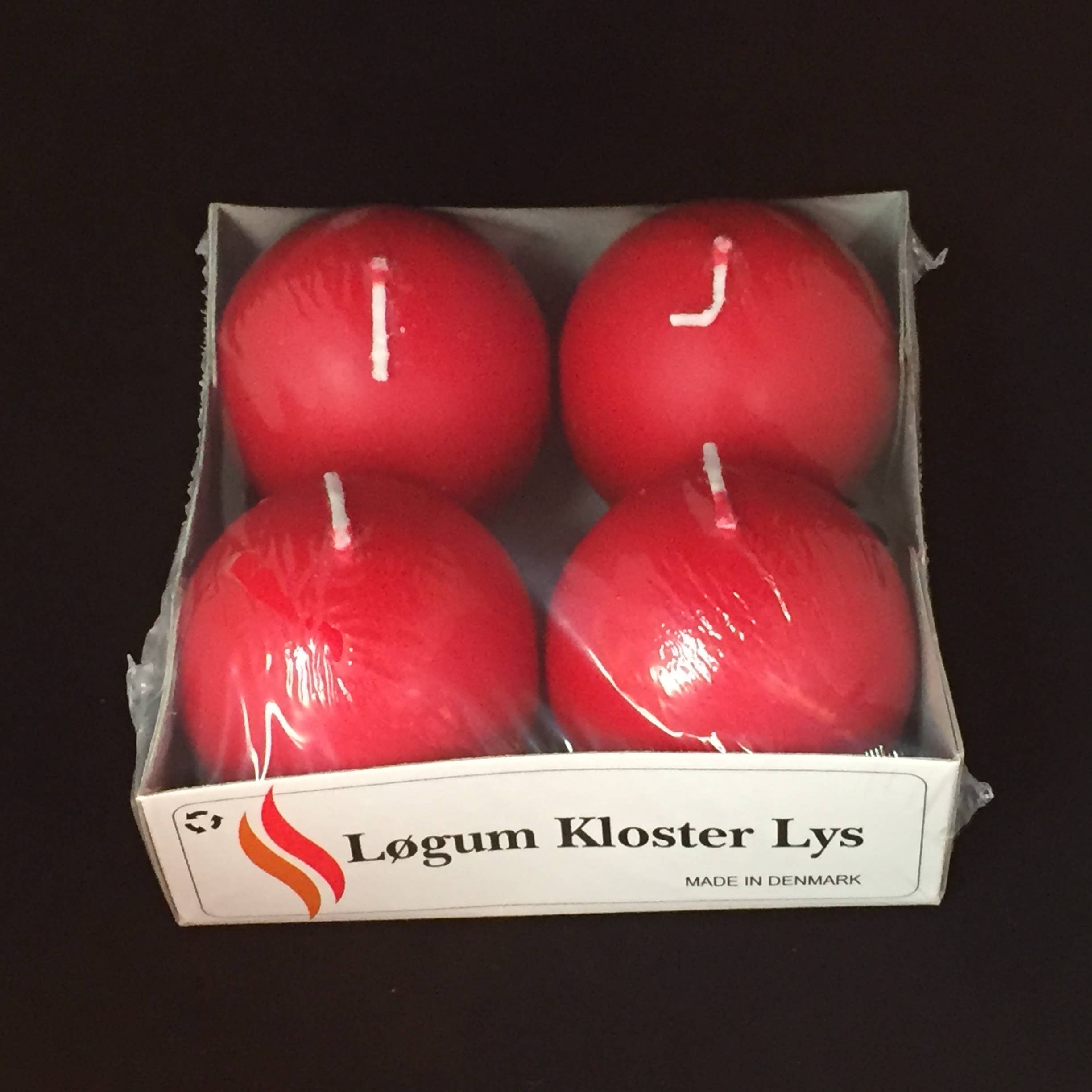 A box of four 2.5" red ball candles, named Logum Kloster Lys and crafted from natural wax, featuring a MADE IN DENMARK label.