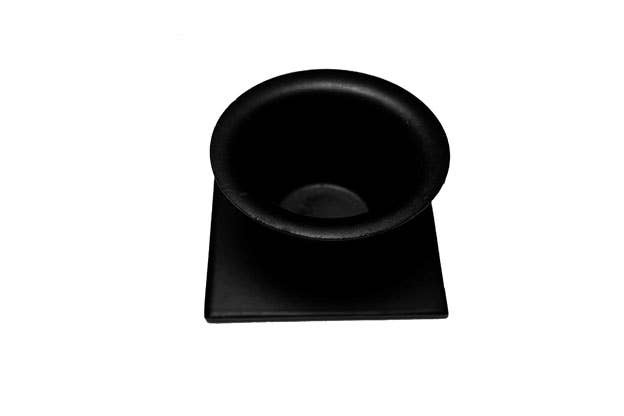 The Square Black Wrought Iron Taper Candle Holder is a black hollow cylindrical object on a square base, seen from above against a white background.