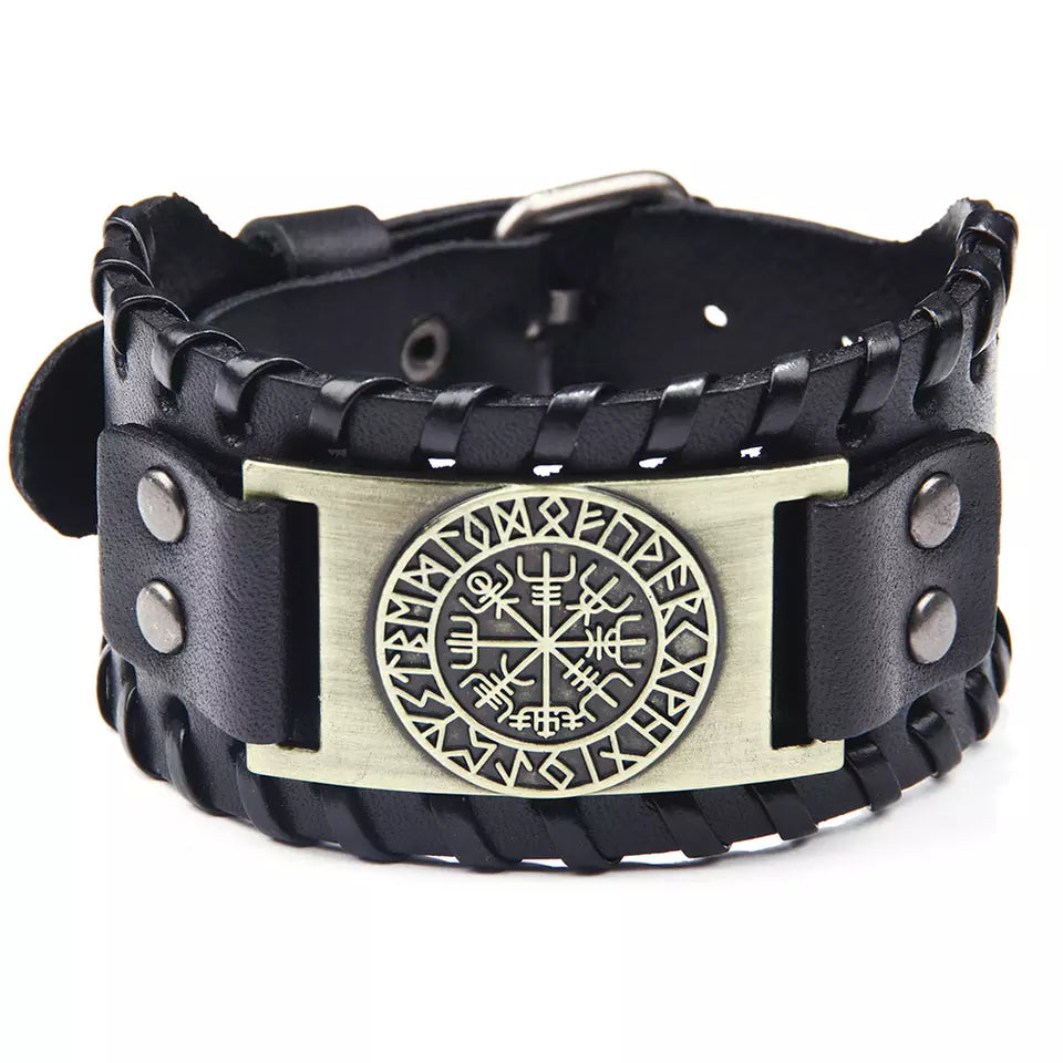 The Bracelet: The Viking Compass Vegvisir features black leather with braided edges, metal rivets, and a central rectangular plate showcasing the Norse Vegvisir runic compass—an eye-catching piece of Norse mythology jewelry.