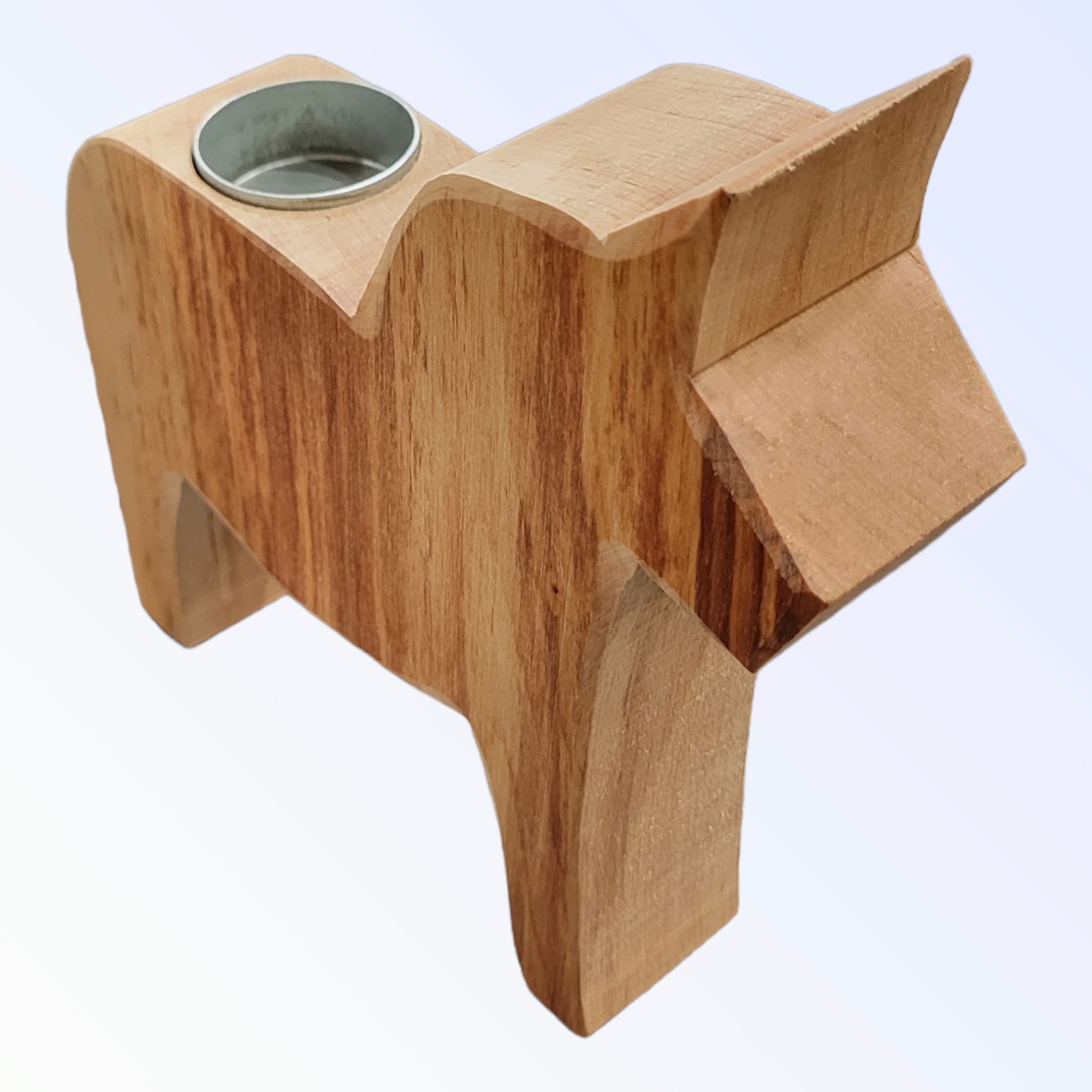 A handcrafted wooden, horse-shaped tea candle holder with a metal insert.