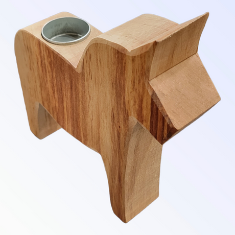 An 8" tall handcrafted Dala Horse Tea Light Candle Holder, made from natural pine, features a metal insert for a tealight—an artful Swedish twist on the classic wooden candle holder.