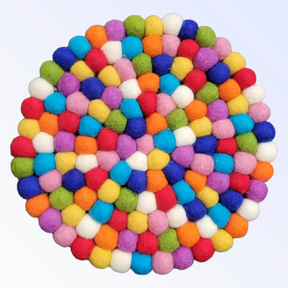 Multi-Color Round Wool Felted Pom-Pom Trivet features a handcrafted design with vibrant, closely packed wool felt balls arranged in a symmetrical pattern.