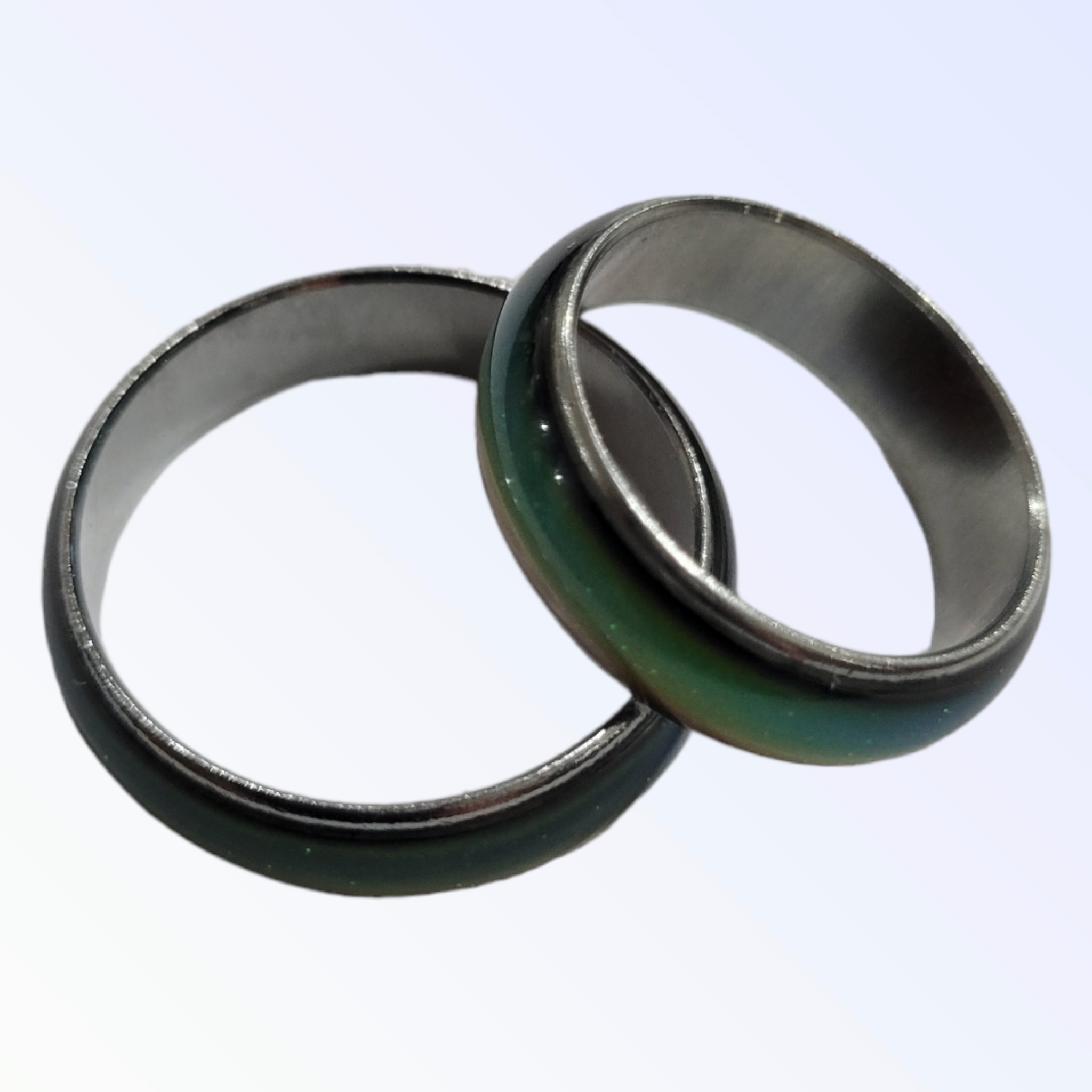 Two Ring: Mood Ring Circle bands with a subtle iridescent sheen overlap on a light gradient background.
