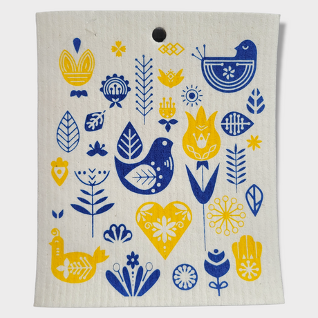 The Dish Cloth: Yellow & Blue Birds Swedish Dish Cloth features blue and yellow Scandinavian-style bird, flower, and abstract illustrations on a white background. It adds elegance to your kitchen and is environmentally friendly.