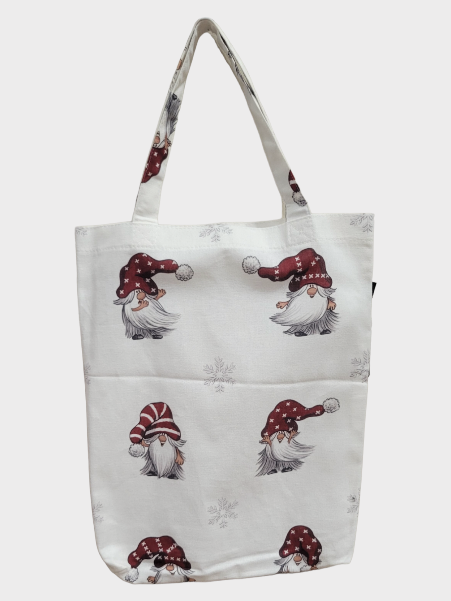 Tomte Tote featuring illustrations of gnomes in red hats.