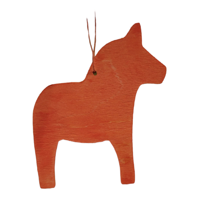 The Orange Horse Ornament, inspired by Swedish folk art, is crafted from wood and painted in a vibrant orange hue. It includes a small hanging loop at the top, making it ideal for your holiday décor.