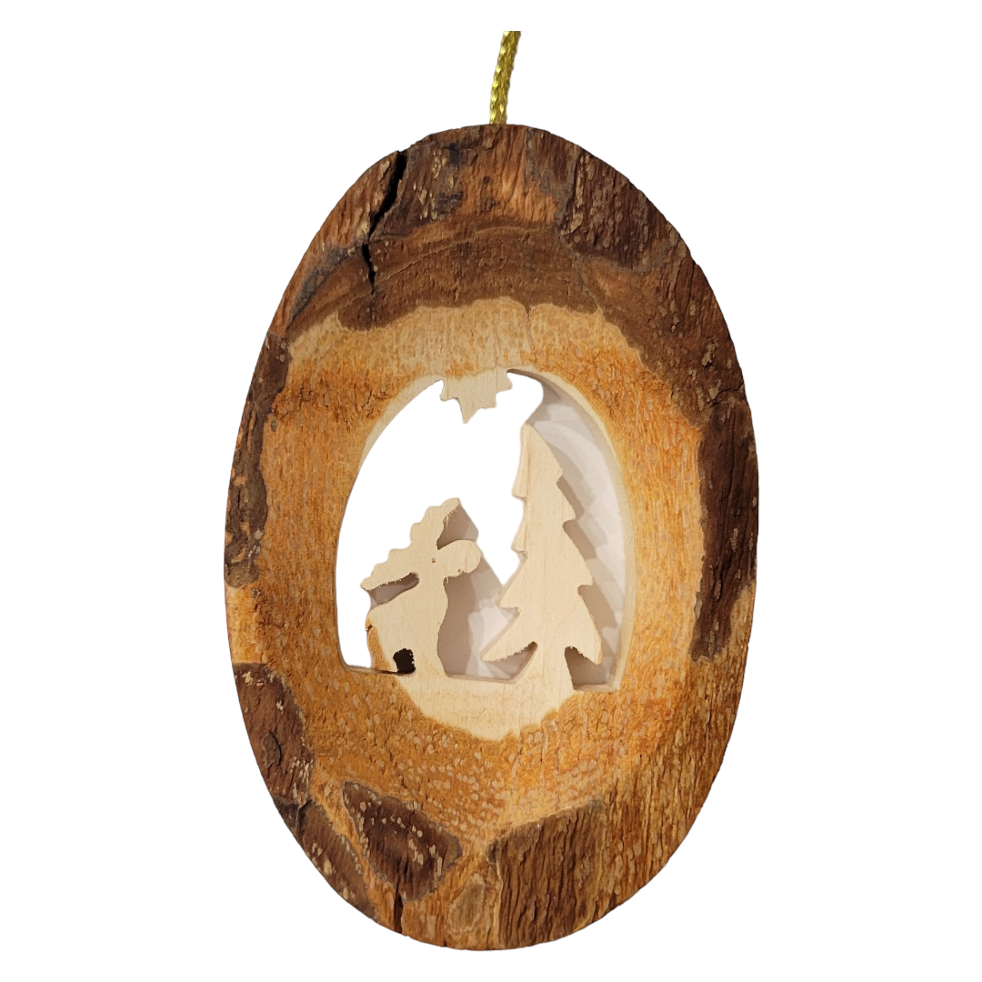 Ornament: Bark Moose w/Tree featuring a laser-cut design of a tree and cabin with natural bark texture and equipped with a hanging cord.