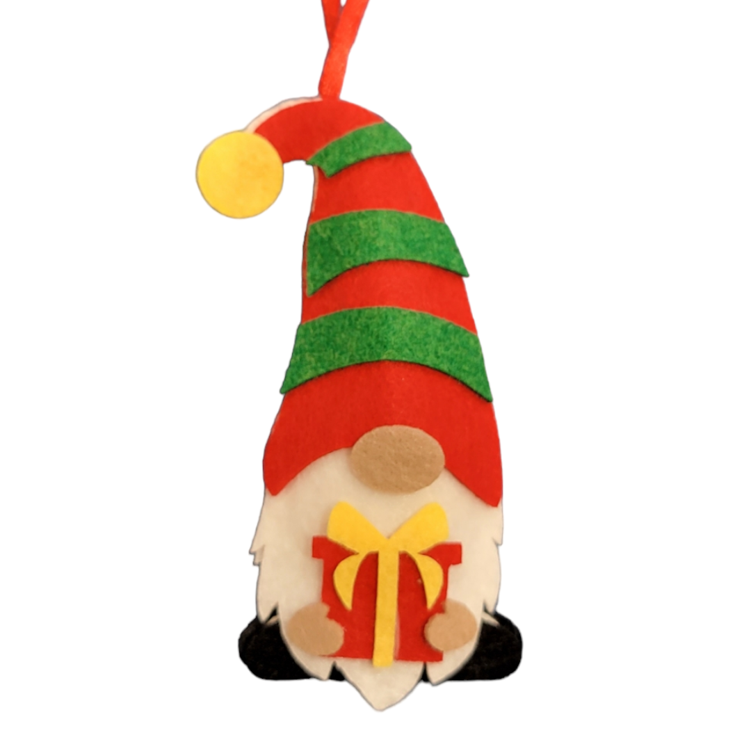 The Ornament: WoollyUlly Felt Gnome brings a touch of Scandinavian charm with its red and green striped hat, clutching a yellow gift embellished with a striking red ribbon. It's ideal for anyone who appreciates the whimsical allure of classic Tomte gnomes.