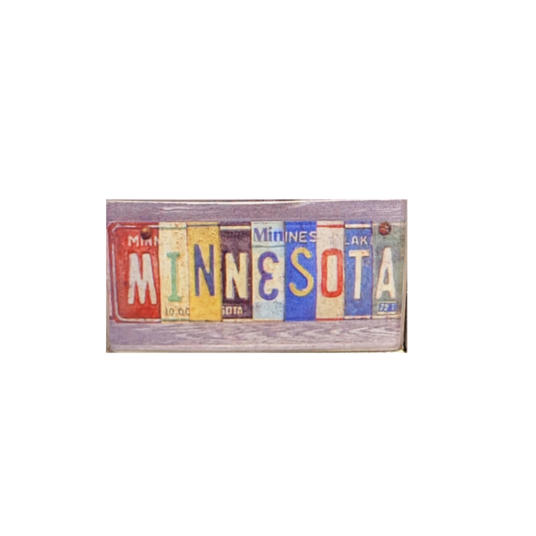 Crafted from multicolored license plates, this vintage Americana masterpiece spells out MINNESOTA, making it perfect for collectors and enthusiasts of MN Vintage License Plate Keychains alike.