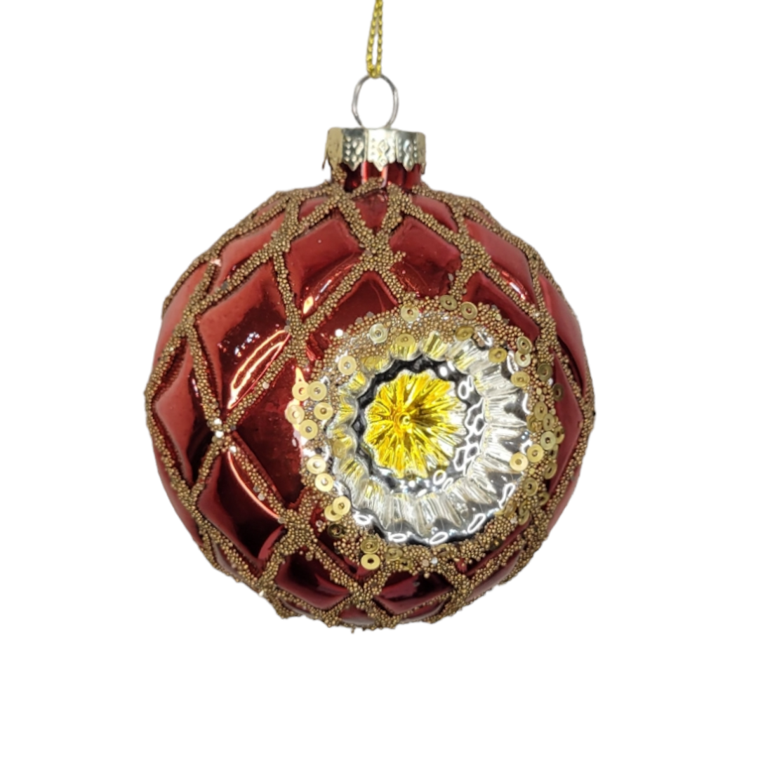 The "Ornament: Glass Ball Red Deco" showcases a vintage Christmas design with a red and gold textured pattern, echoing Art Deco styles. It features a central circular motif embellished with sequins and a shimmering yellow center.