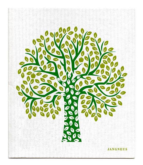 This illustration showcases a "Tree - Green" dish cloth, featuring lush green and olive leaves on elegant branches against a white background, capturing the clean and minimalist aesthetic of a Scandinavian style kitchen.