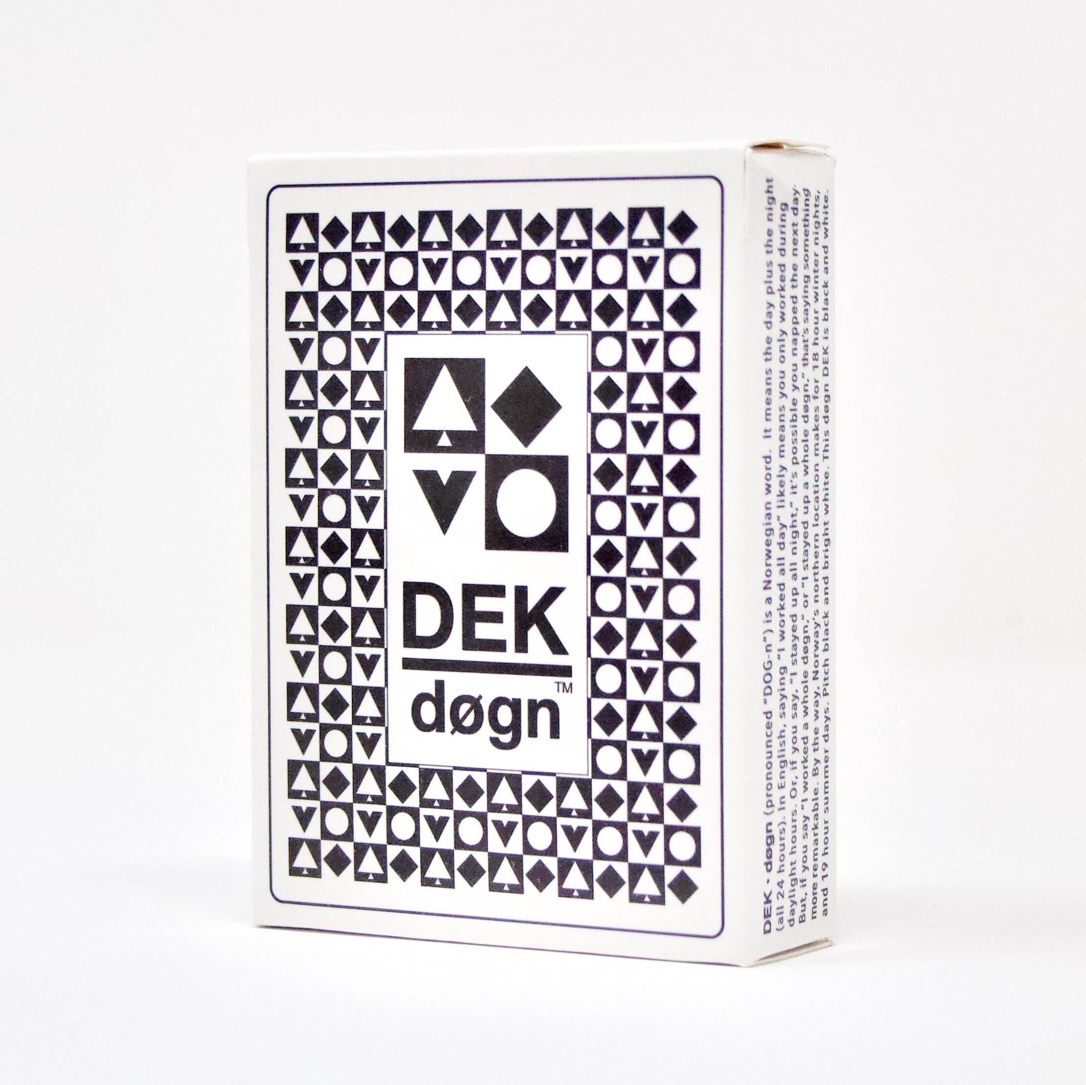 A box containing a deck of playing cards showcases a sophisticated Norwegian design, adorned with black triangles and squares framing the text "DEK Døgn.