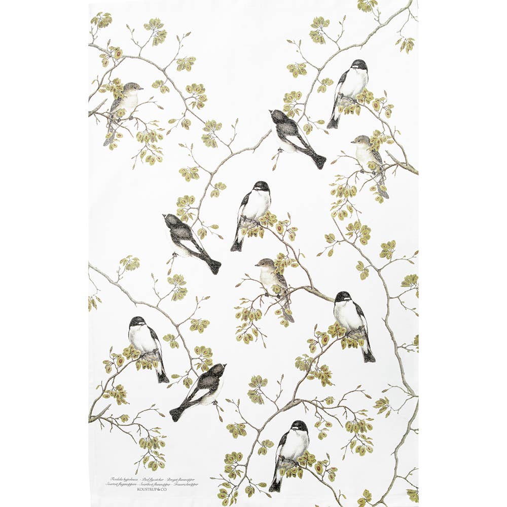 A charming tea towel featuring an illustration of Pied Flycatchers perched on branches with green leaves against a white background, presented as the "Garden Birds - Pied Flycatcher Tea Towel" made from 100% organic cotton.