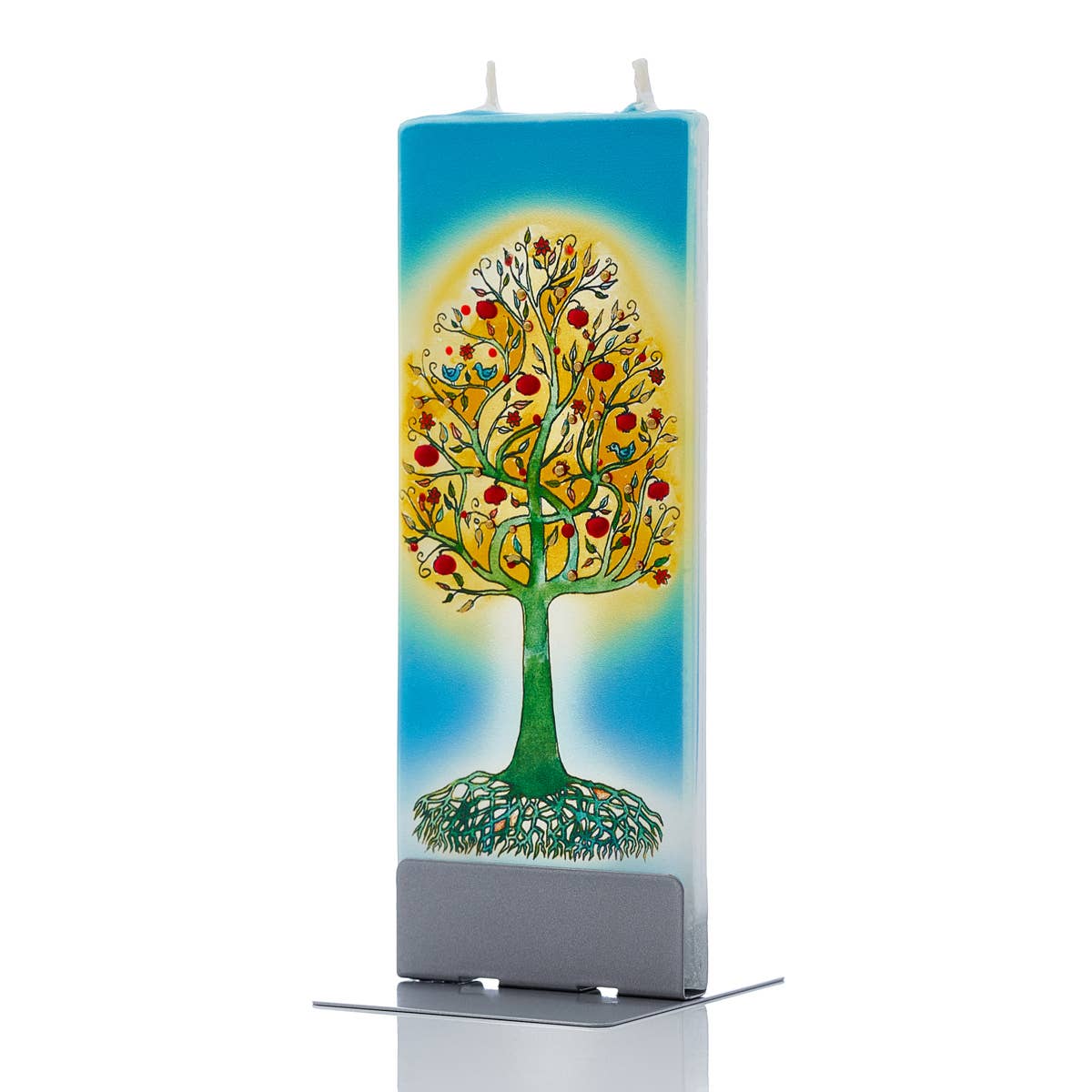 The Candle: Tree of Life - Flat Candle is a rectangular, hand-painted piece that showcases a vibrant Tree of Life design adorned with red and yellow fruits against a blue background. It features two wicks and rests elegantly on a gray stand, making it an exquisite centerpiece.