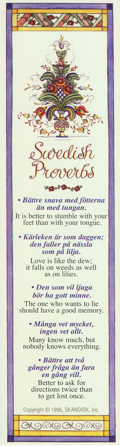 The Bookmark: Swedish Proverbs (Blue) showcases a decorative floral design inspired by Swedish folk art and includes translations of Swedish proverbs by Linda Allen, encapsulating themes of love, memory, and wisdom.