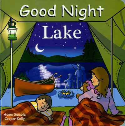 The cover of the "Good Night Lake" board book portrays a child and adult inside a tent, overlooking a serene lake at night. The scene includes a canoe, campfire, and people stargazing, beautifully capturing the magical essence of children's bedtime amidst natural and cultural wonders.