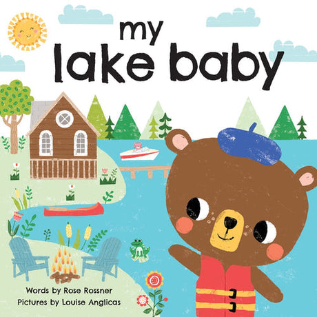 Book cover for "My Lake Baby" featuring a bear wearing a life jacket by the lake, accompanied by a cabin, boats, outdoor chairs, and campfire s'mores.